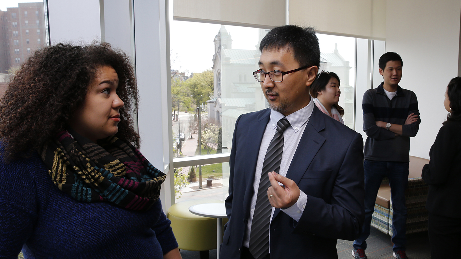 The new GVPA 100 undergraduate course is instructed by Myung Jin (at right), associate professor and chair of the Master of Public Administration program.